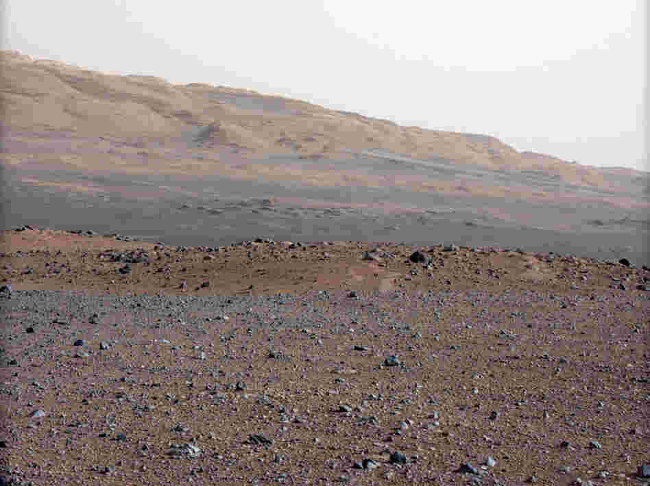 This photo, taken by NASA's Curiosity rover, shows Mars' Gale Crater, where the rover has taken samples for chemical analysis. Scientists believe that at some point in the very distant past, there was a riverbed here.