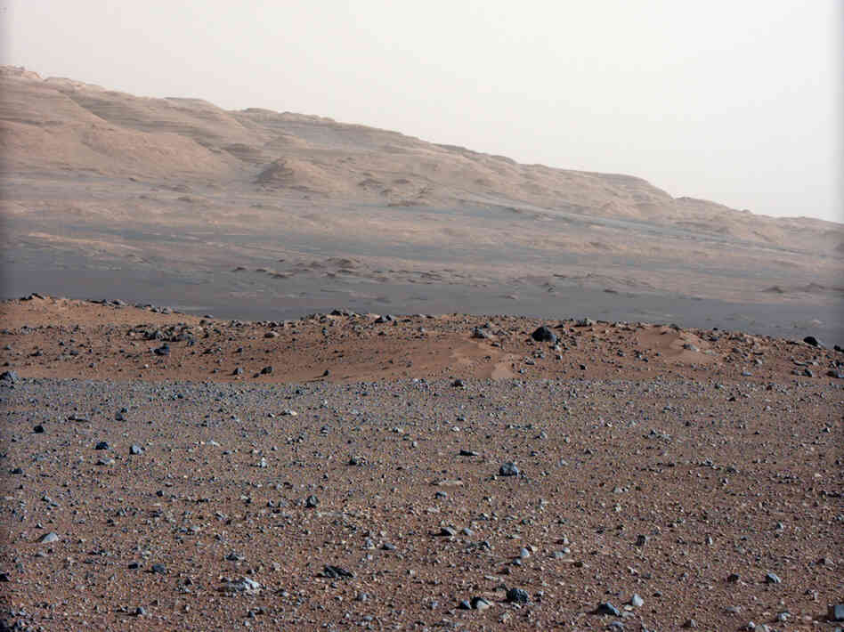 This photo, taken by NASA's Curiosity rover, shows Mars' Gale Crater, where the rover has taken samples for chemical analysis. Scientists believe that at some point in the very distant past, there was a riverbed here.