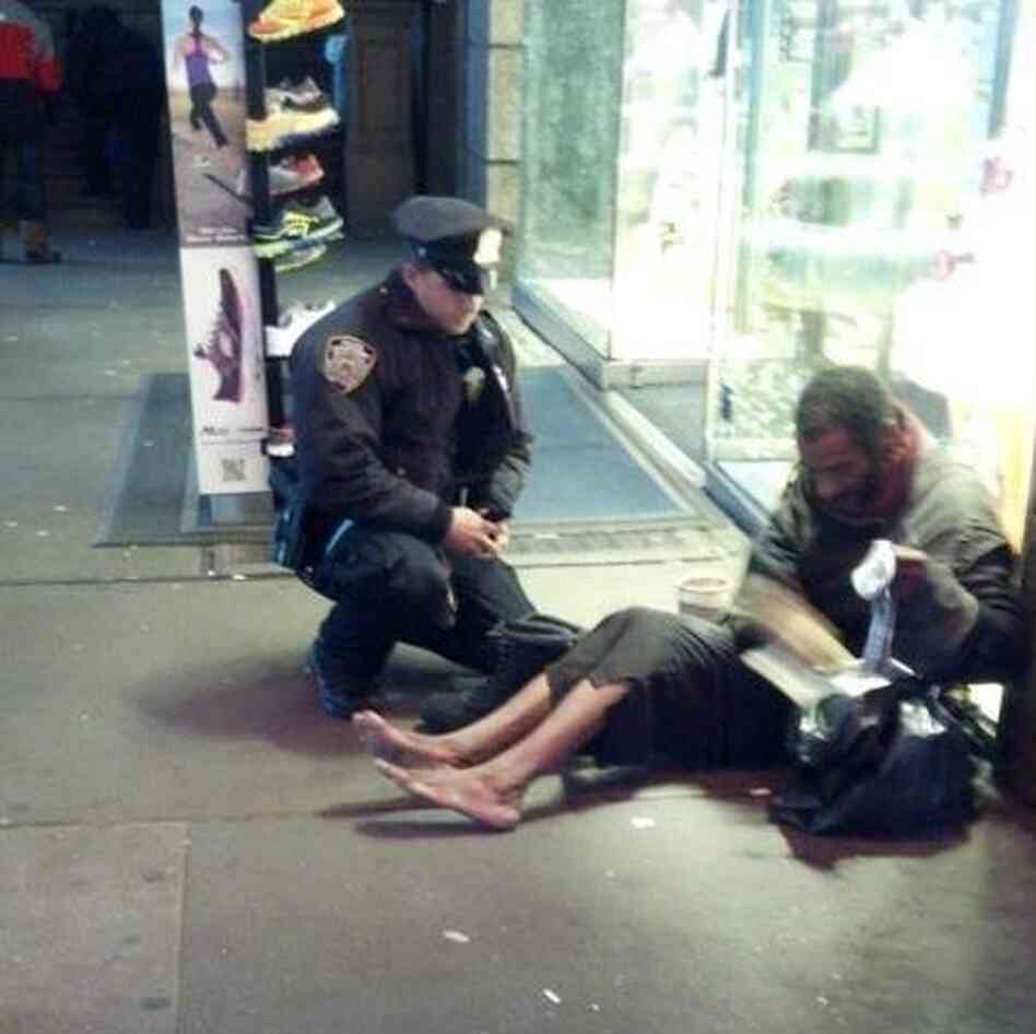 The photo that touched many hearts: New York City Police Officer Lawrence DePrimo gives a shoeless man a pair of boots on a frigid night last month. That man was later identified as 54-year-old Jeffrey Hillman. The photo that touched many hearts: New York City Police Officer Lawrence DePrimo gives a shoeless man a pair of boots on a frigid night last month. That man was later identified as 54-year-old Jeffrey Hillman.