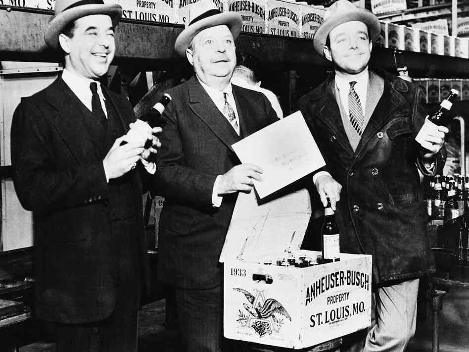August A. Busch (center) and his sons, Adolphus III (left) and August Jr., seal the first case of beer off the Anheuser-Busch bottling plant line in St. Louis on April 7, 1933, when the sale of low-alcohol beers and wines was once again legal. Prohibition didn't officially end until Dec. 5 of that year. August A. Busch (center) and his sons, Adolphus III (left) and August Jr., seal the first case of beer off the Anheuser-Busch bottling plant line in St. Louis on April 7, 1933, when the sale of low-alcohol beers and wines was once again legal. Prohibition didn't officially end until Dec. 5 of that year.