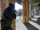 A Syrian soldier aims his rifle during clashes in the Damascus suburb of Daraya on Sunday. There is frequent fighting in and around Damascus, and residents are increasingly worried about a major battle for the capital. A Syrian soldier aims his rifle during clashes in the Damascus suburb of Daraya on Sunday. There is frequent fighting in and around Damascus, and residents are increasingly worried about a major battle for the capital.