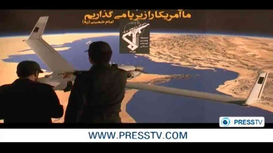 A screen image from the video released by Iranian TV of what the military there claims is a captured U.S. drone.