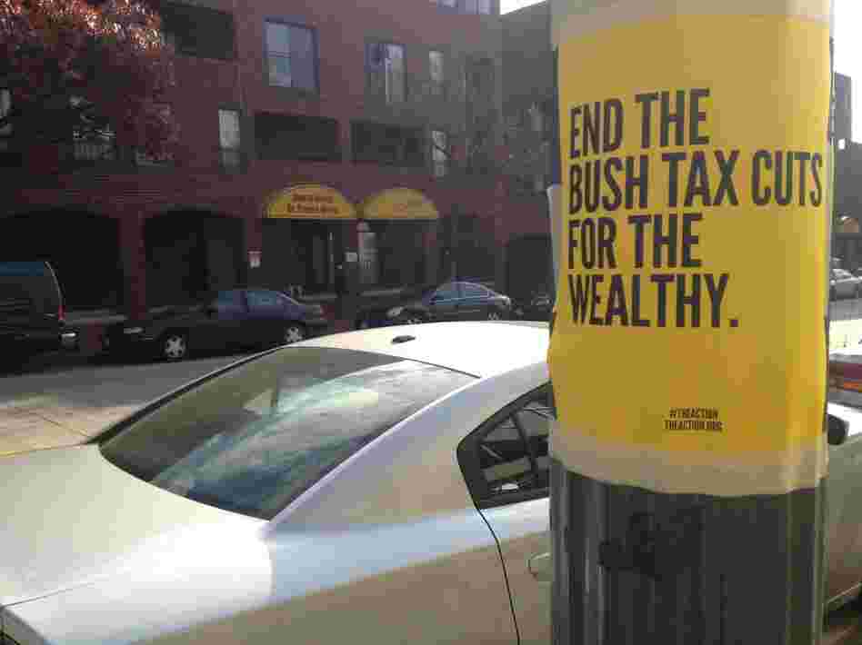 A sign in downtown Washington, D.C., on Tuesday. The president, congressional Republicans and outside groups all are trying to rally public support for their positions in the fiscal talks.