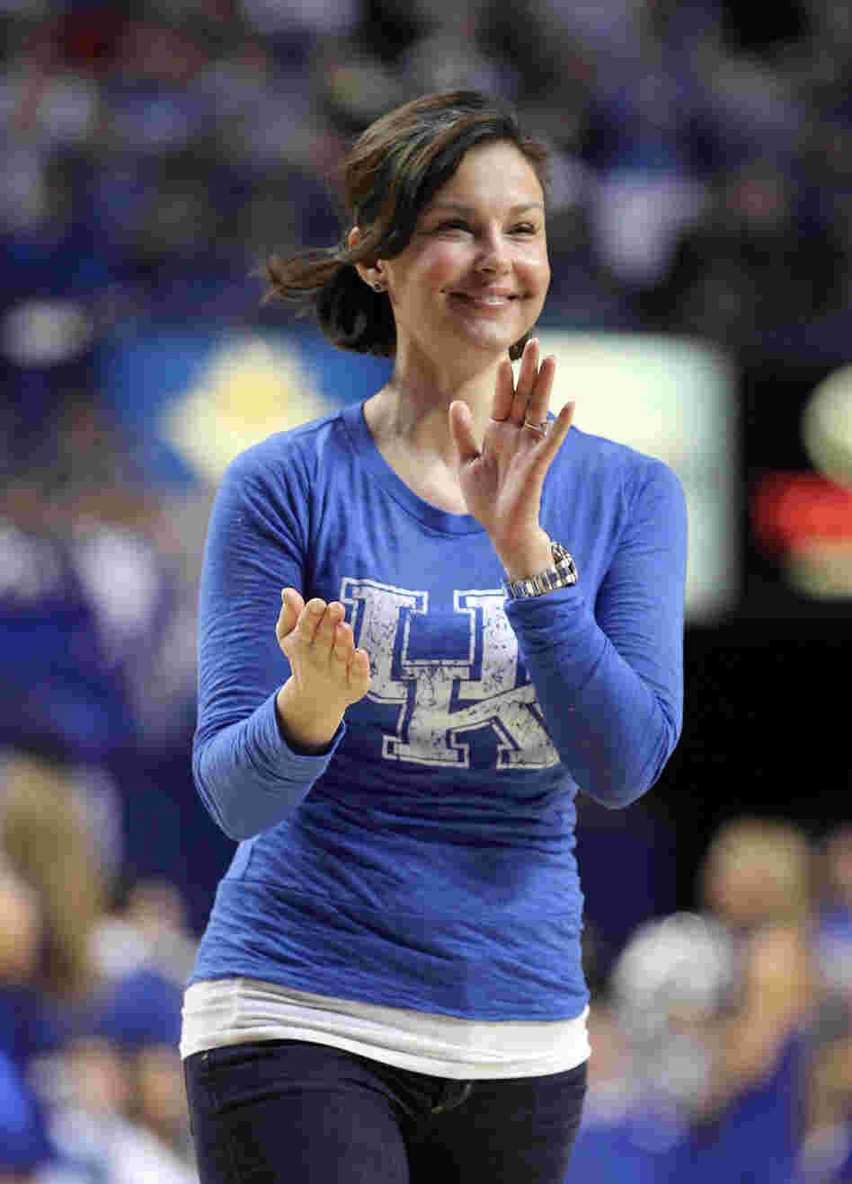 Ashley Judd acknowledges the crowd during a University of Kentucky Wildcats basketball game at Rupp Arena in Lexington, Ky., in January.