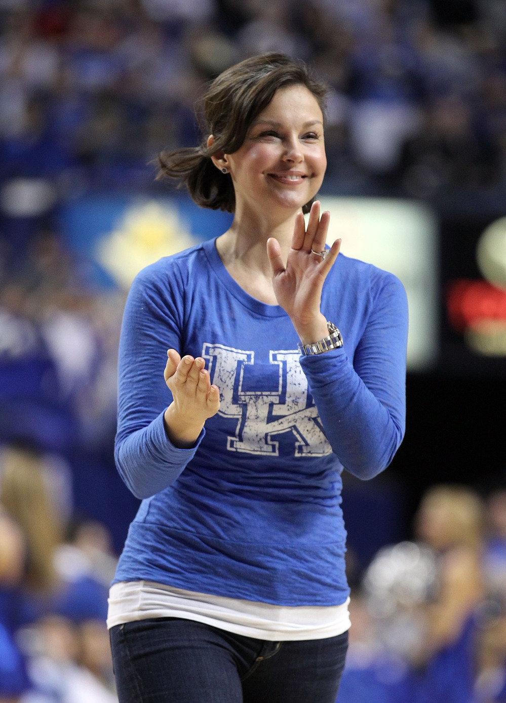 Ashley Judd acknowledges the crowd during a University of Kentucky Wildcats basketball game at Rupp Arena in Lexington, Ky., on Jan. 21, 2012.