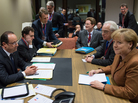 French President Francois Hollande (left) and German Chancellor Angela Merkel take part in a bilateral meeting at the EU headquarters in Brussels on Nov. 22 as part of a European budget summit. French President Francois Hollande (left) and German Chancellor Angela Merkel take part in a bilateral meeting at the EU headquarters in Brussels on Nov. 22 as part of a European budget summit.