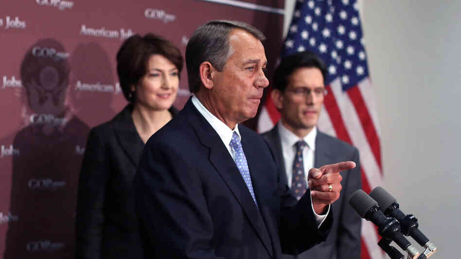 House Speaker John Boehner, R-Ohio, takes questions as House Majority Leader Eric Cantor, R-Va., and Rep. Cathy McMorris Rodgers, R-Wash., look on during a Capitol Hill news conference on Wednesday.