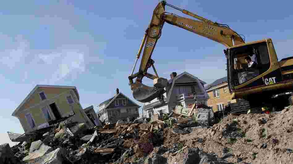 Cleanup continues on the site of a demolished home on the Rockaway Peninsula in New York on Nov. 29.