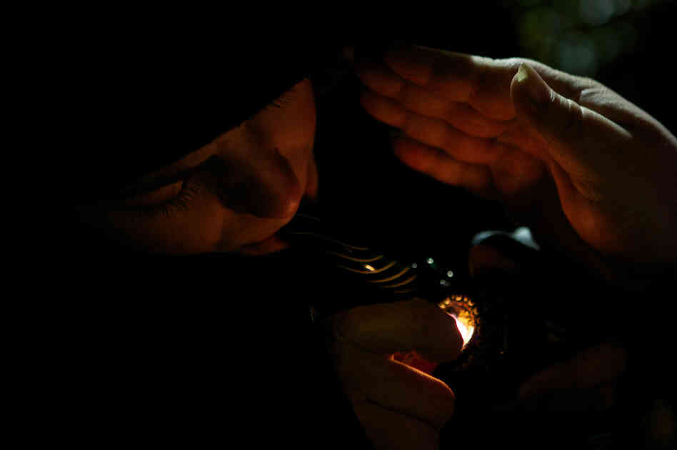 A resident of Tacoma, Washington smokes marijuana shortly before a law legalizing the recreational use of marijuana took effect in Seattle, Washington. A resident of Tacoma, Washington smokes marijuana shortly before a law legalizing the recreational use of marijuana took effect in Seattle, Washington.