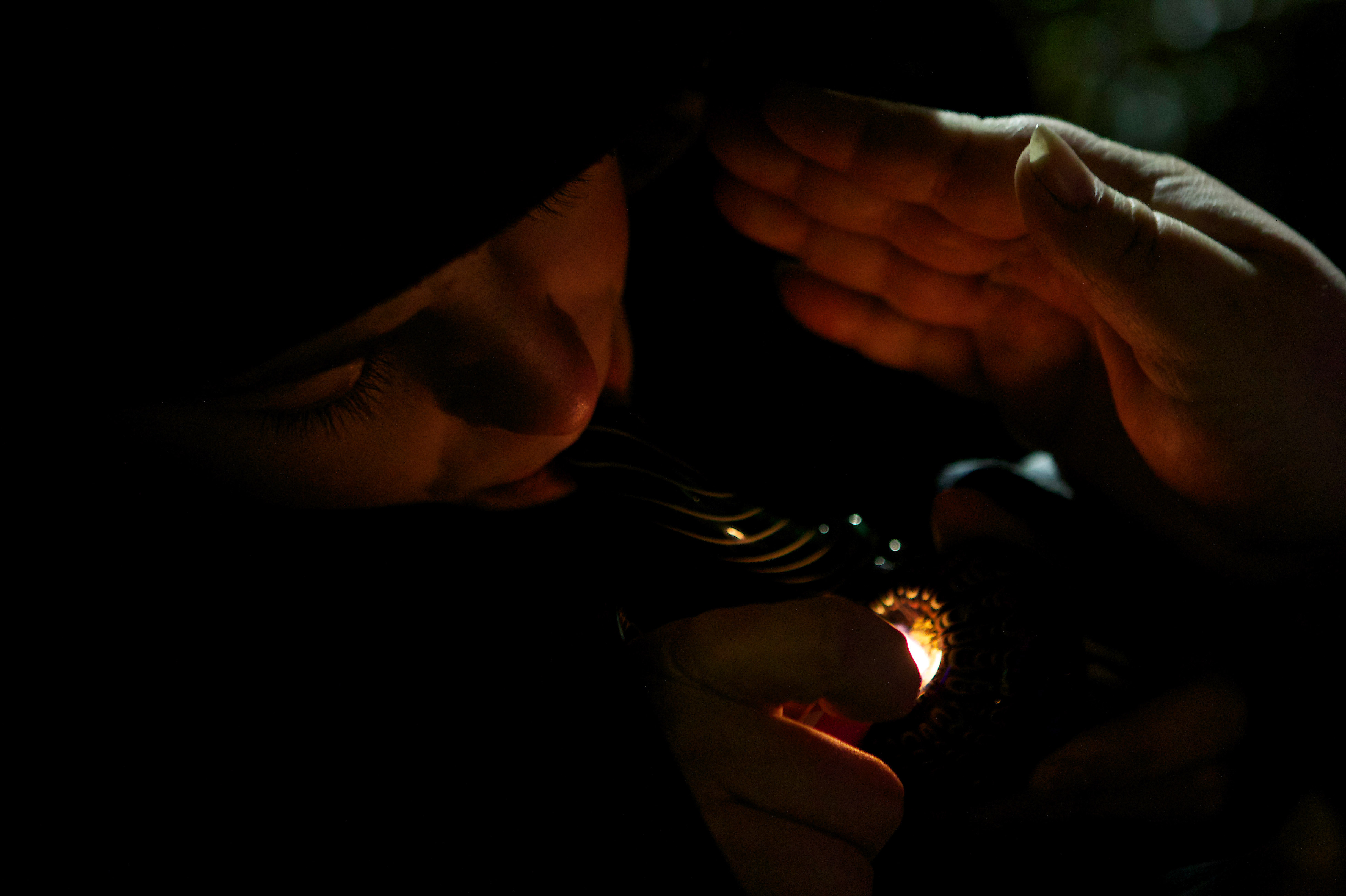 A resident of Tacoma, Washington smokes marijuana shortly before a law legalizing the recreational use of marijuana took effect in Seattle, Washington.