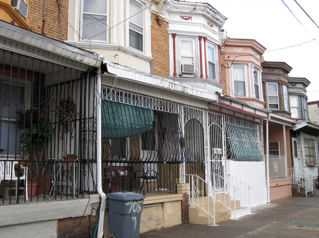 Because of the city's high crime rate, protective iron bars encase the front porches of many houses in Camden. Residents call them "bird cages."
