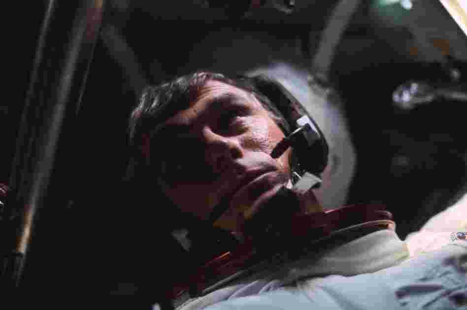 Cernan is seen in the command module during the outbound trip to the moon.
