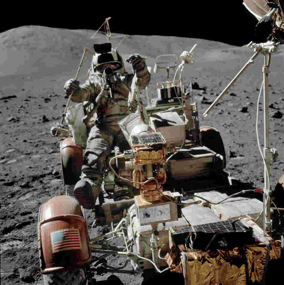 Cernan photographed Schmitt while he set up a transmitter used in a geological experiment.