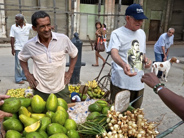 Cuba has relaxed some business rules, allowing street vendors to sell produce and a large wholesale produce market to open at night on the edge of Havana.