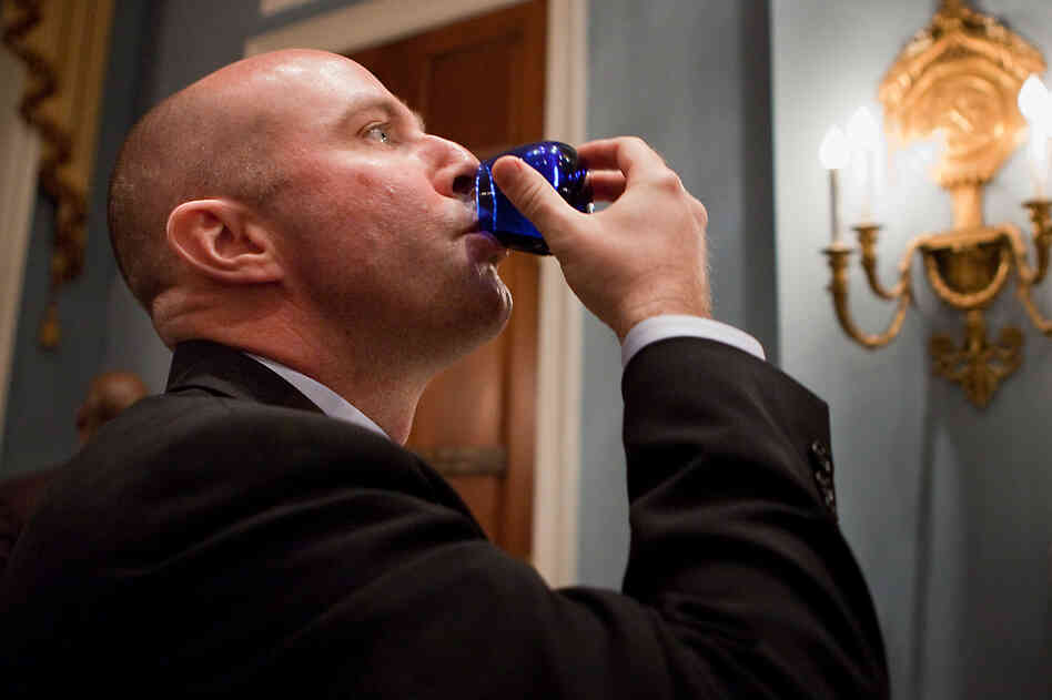 Gregg Kelley of California Olive Ranch taste tests his competitor's brand. Gregg Kelley of California Olive Ranch taste tests his competitor's brand.