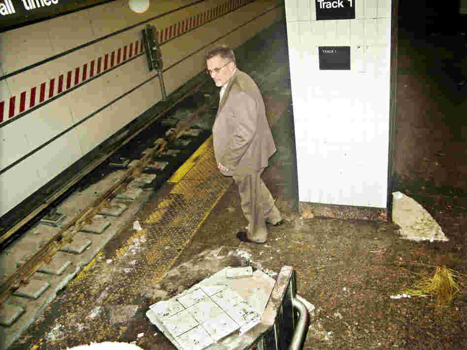 Joseph Leader, chief maintenance officer of the New York City subway system, surveys damage caused by Superstorm Sandy, this week at the South Ferry station.
