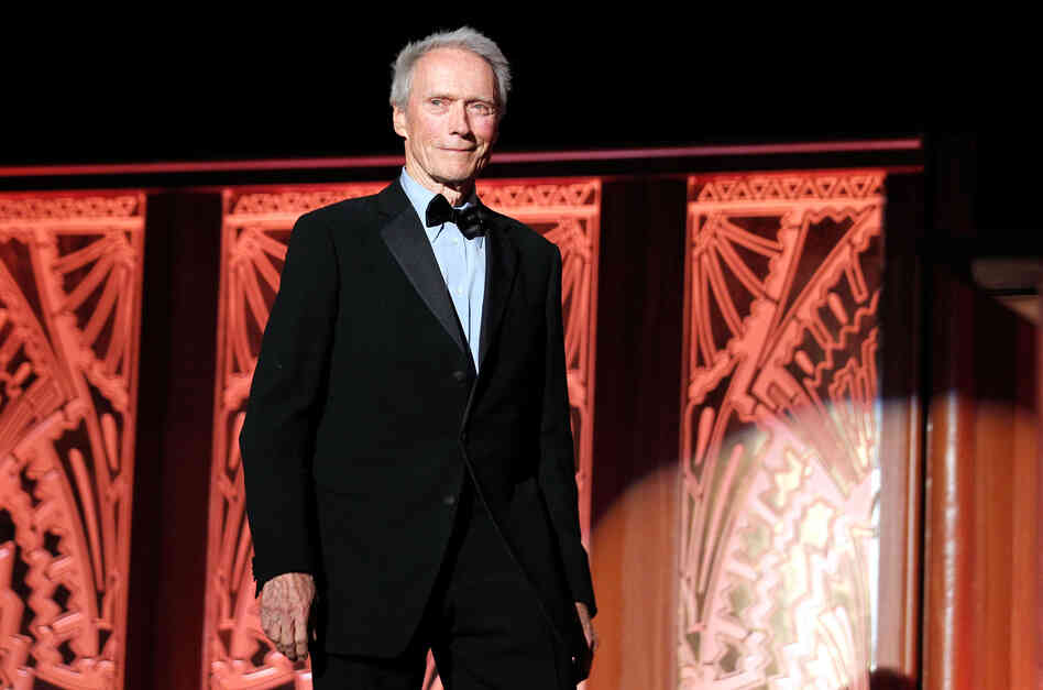 Clint Eastwood, 6 foot 4, speaks onstage at the 39th AFI Life Achievement Award honoring Morgan Freeman on June 9, 2011.