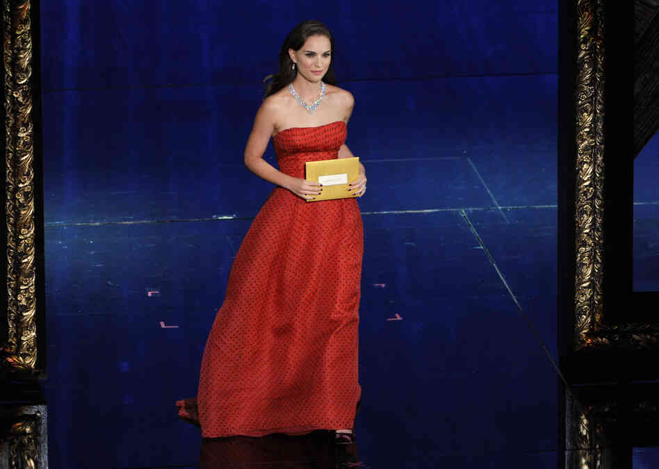 Presenter Natalie Portman, 5 feet 3 inches, at the 84th Annual Academy Awards.