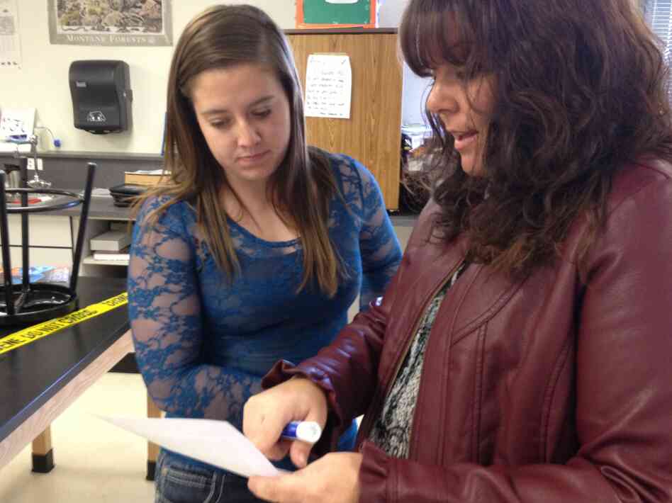 Jessica goes over her work with teacher Jennifer Goodnight. Goodnight says "flipping" her class has improved students' test scores. Jessica goes over her work with teacher Jennifer Goodnight. Goodnight says "flipping" her class has improved students' test scores.