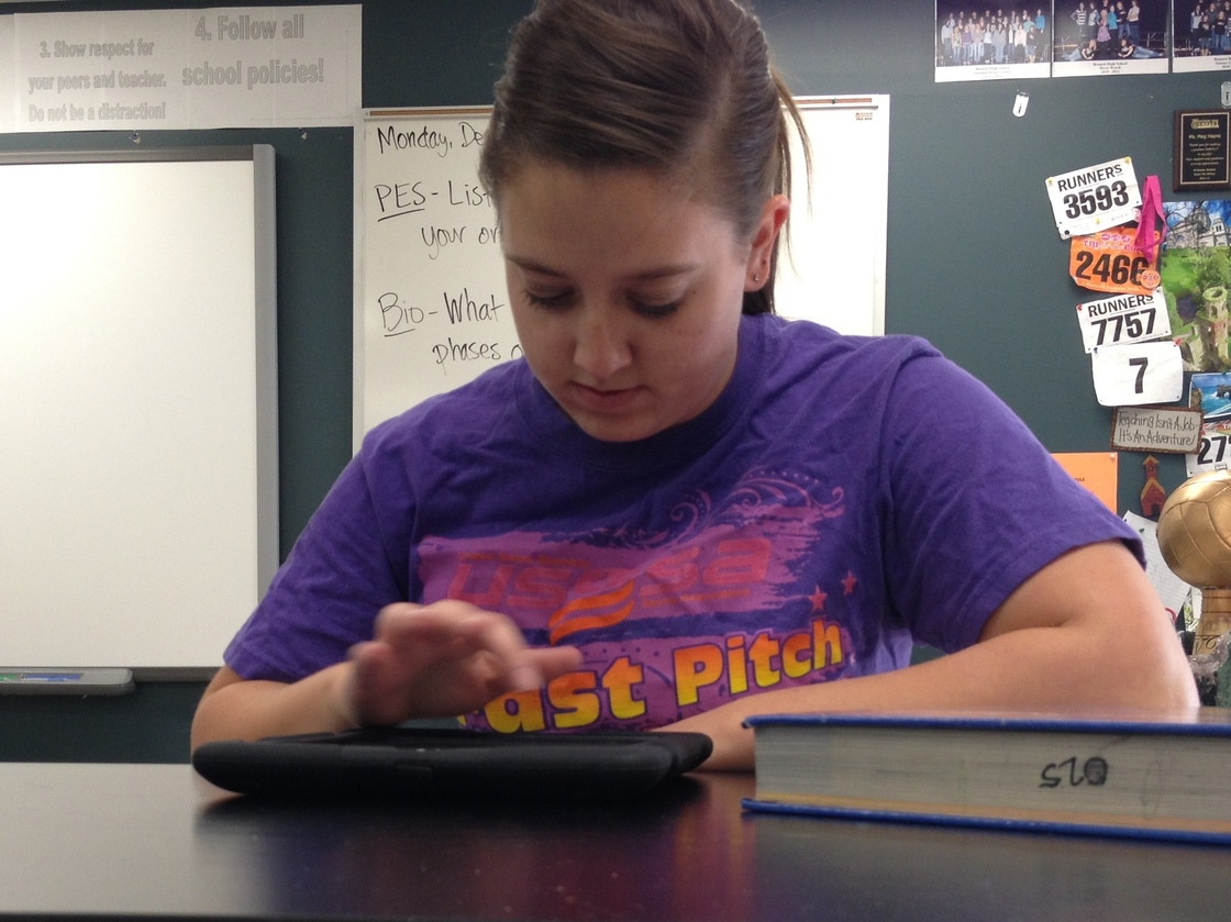 High school sophomore Jessica Miller watches her chemistry teacher's lectures on an iPad. Class time is used for working through problems and quizzes, rather than lecturing.