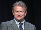 Actor Hugh Bonneville speaks onstage in Beverly Hills, Calif., in July 2012. Actor Hugh Bonneville speaks onstage in Beverly Hills, Calif., in July 2012.