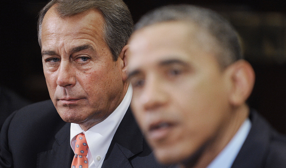 Speaker of the House John Boehner listens as President Obama speaks during a meeting with bipartisan group of congressional leaders in November.