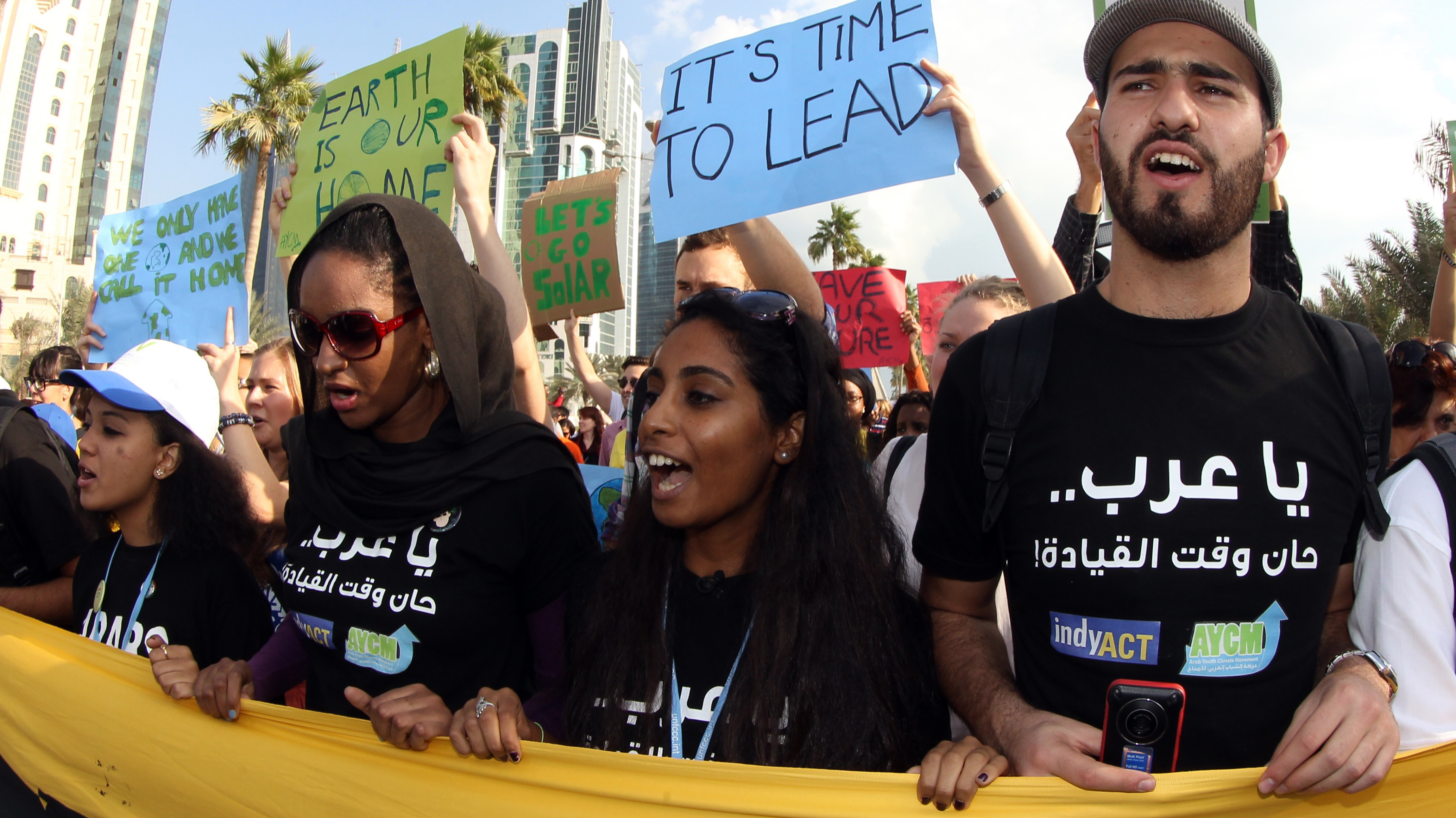 Climate activists at a rally in Doha on December 1, 2012.