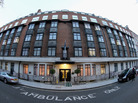 Two Police Officers stand guard in the early morning at the King Edward VII Private Hospital in London, England. Two Police Officers stand guard in the early morning at the King Edward VII Private Hospital in London, England.