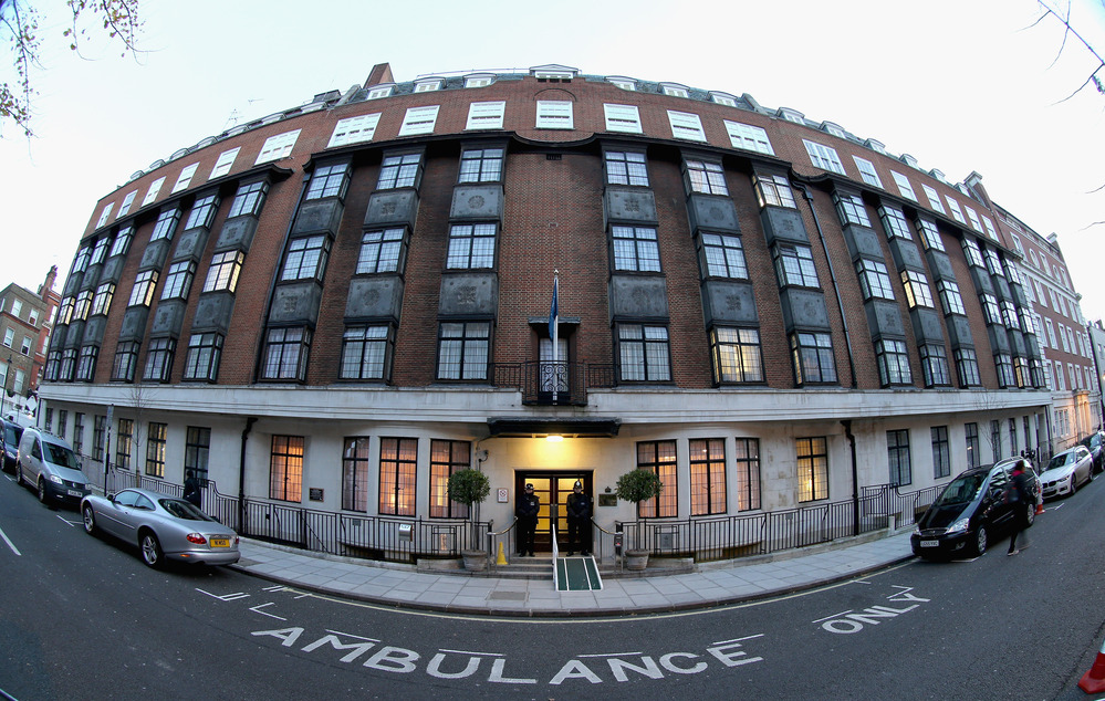 Two Police Officers stand guard in the early morning at the King Edward VII Private Hospital in London, England.