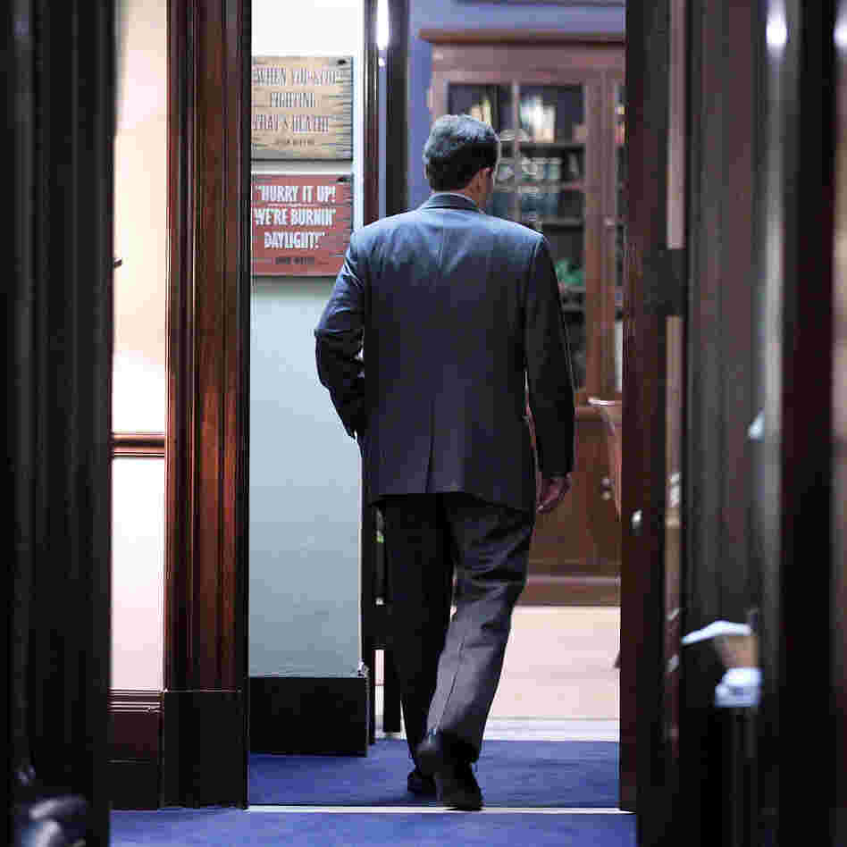 Sen. Jim DeMint, R-S.C., enters his Capitol Hill office on Dec. 6.