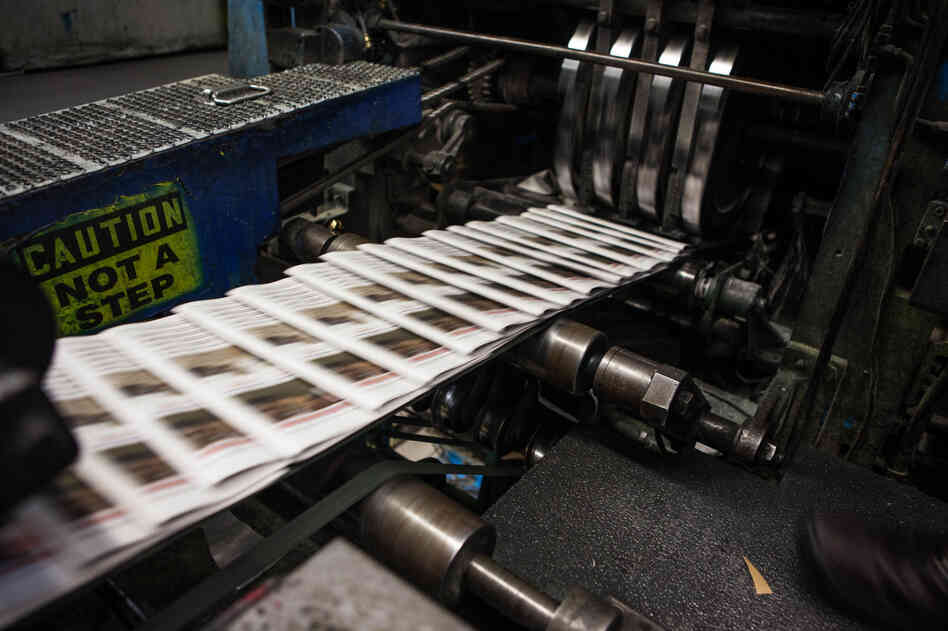 Copies of The Orange County Register slide through the presses. The Register is the country's 20th most-read daily, with a circulation of about 285,000.