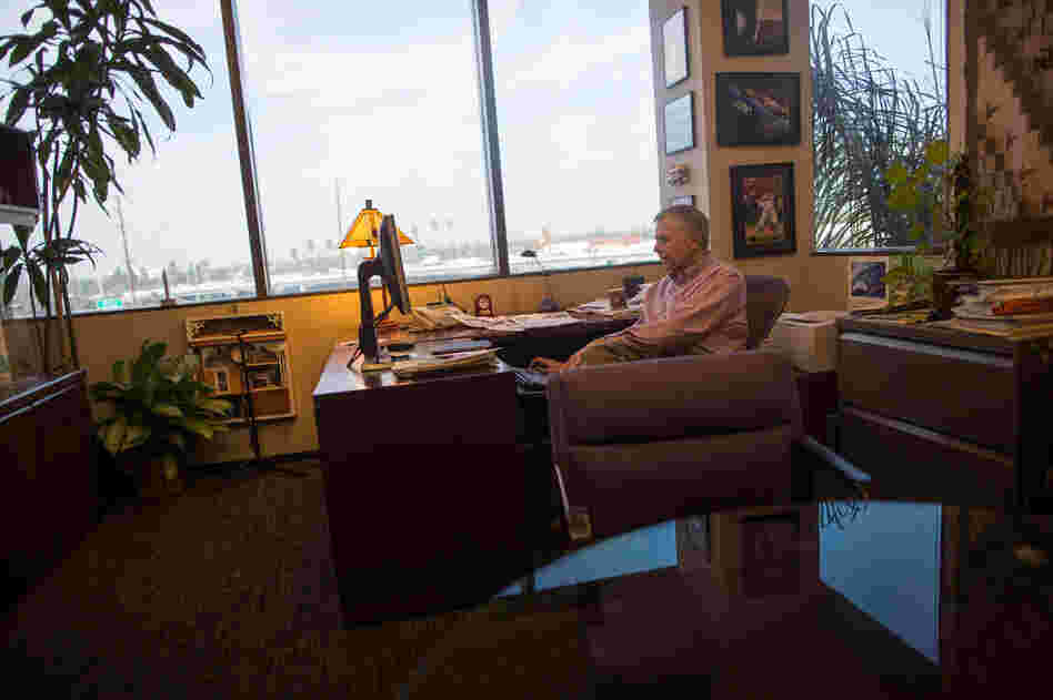 Ken Brusic, senior vice president for content, works in his office overlooking the 5 Freeway. In the last few weeks, Brusic has hired some two dozen newsroom positions.
