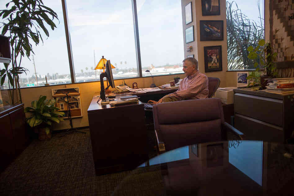 Ken Brusic, senior vice president for content, works in his office overlooking the 5 Freeway. In the past few weeks, Brusic has hired some two-dozen newsroom positions.