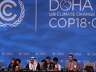 Delegates attend the last day of the U.N. climate talks in Doha, Qatar, on Friday. U.N. climate negotiators locked horns on the final day of talks in Doha to halt the march of global warming, deeply divided on extending the greenhouse gas-curbing Kyoto Protocol and funding for poor countries. Delegates attend the last day of the U.N. climate talks in Doha, Qatar, on Friday. U.N. climate negotiators locked horns on the final day of talks in Doha to halt the march of global warming, deeply divided on extending the greenhouse gas-curbing Kyoto Protocol and funding for poor countries.