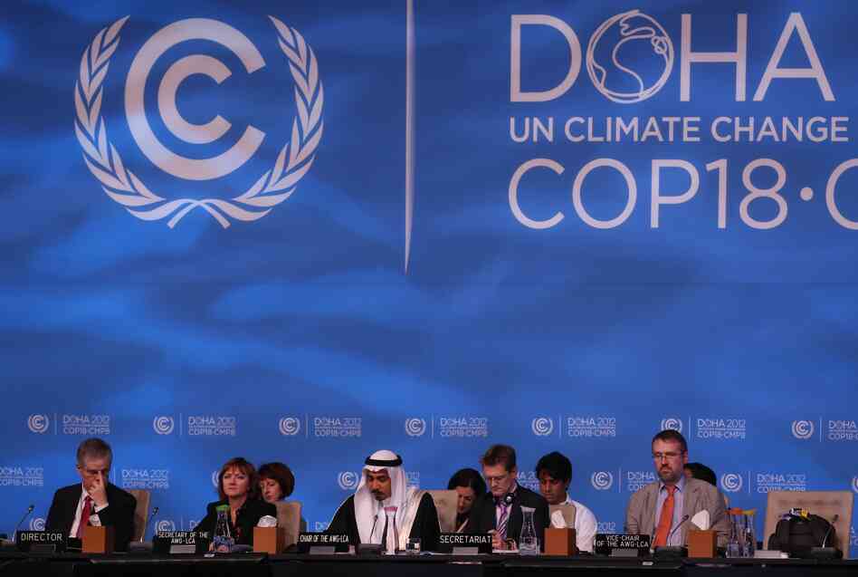 Delegates attend the last day of the U.N. climate talks in Doha, Qatar, on Friday. U.N. climate negotiators locked horns on the final day of talks in Doha to halt the march of global warming, deeply divided on extending the greenhouse gas-curbing Kyoto Protocol and funding for poor countries.