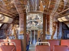 One of the new Versailles commuter trains in France. The cars' interiors are painted to resemble rooms in the Palace of Versailles outside Paris. One of the new Versailles commuter trains in France. The cars' interiors are painted to resemble rooms in the Palace of Versailles outside Paris.
