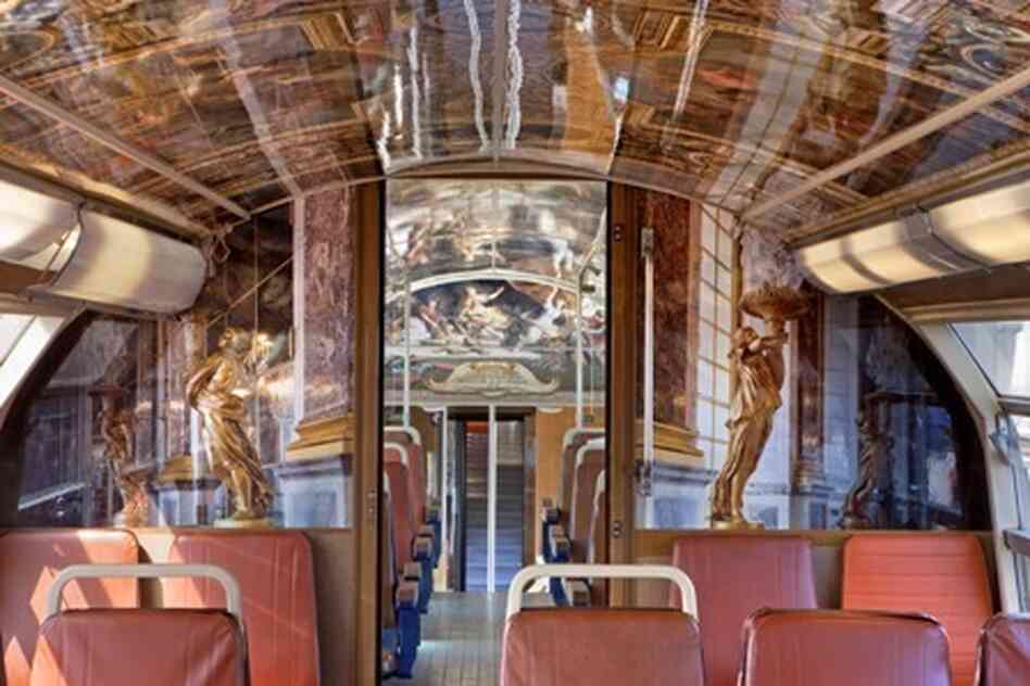 The cars of about 30 trains traveling between Paris and the Palace of Versailles are decorated to reflect rooms and other areas at the famous royal chateau and former seat of French power. Here, the famed Hall of Mirrors.