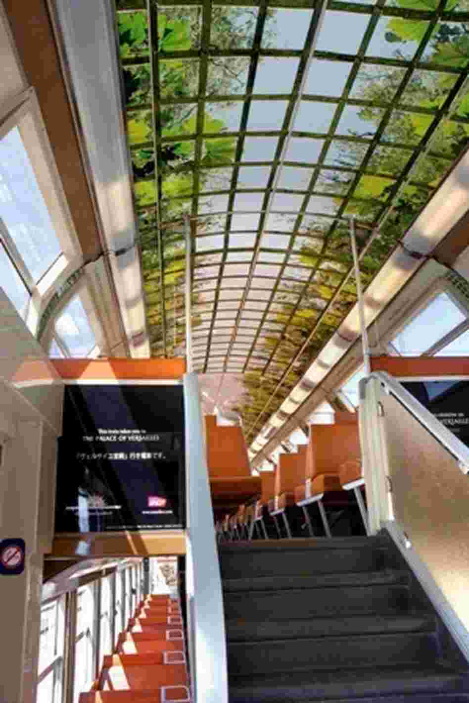 This car on the new Versailles commuter train is decorated to resemble the gardens on Marie-Antoinette's estate. This car on the new Versailles commuter train is decorated to resemble the gardens on Marie-Antoinette's estate.