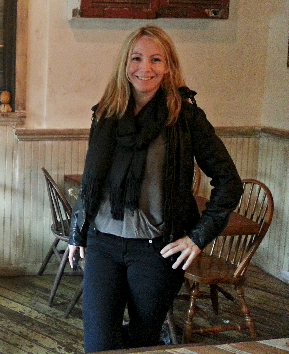 Jenny Adams in the Wayland Bar in Alphabet City, where she stored piles of relief supplies to distribute. Adams raised $10,000 through a crowdfunding website to help her neighbors affected by Hurricane Sandy.
