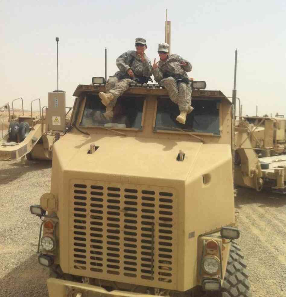 The mother-daughter duo on one of the trucks they drove in Iraq in Camp Speicher, Tikrit, Iraq. The mother-daughter duo on one of the trucks they drove in Iraq in Camp Speicher, Tikrit, Iraq.
