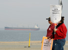 An empty container ship waited near the Port of Los Angeles during the eight-day strike by members of the International Longshore and Warehouse Union. The stoppage put a halt to most of the work at the Los Angeles and Long Beach ports. An empty container ship waited near the Port of Los Angeles during the eight-day strike by members of the International Longshore and Warehouse Union. The stoppage put a halt to most of the work at the Los Angeles and Long Beach ports.