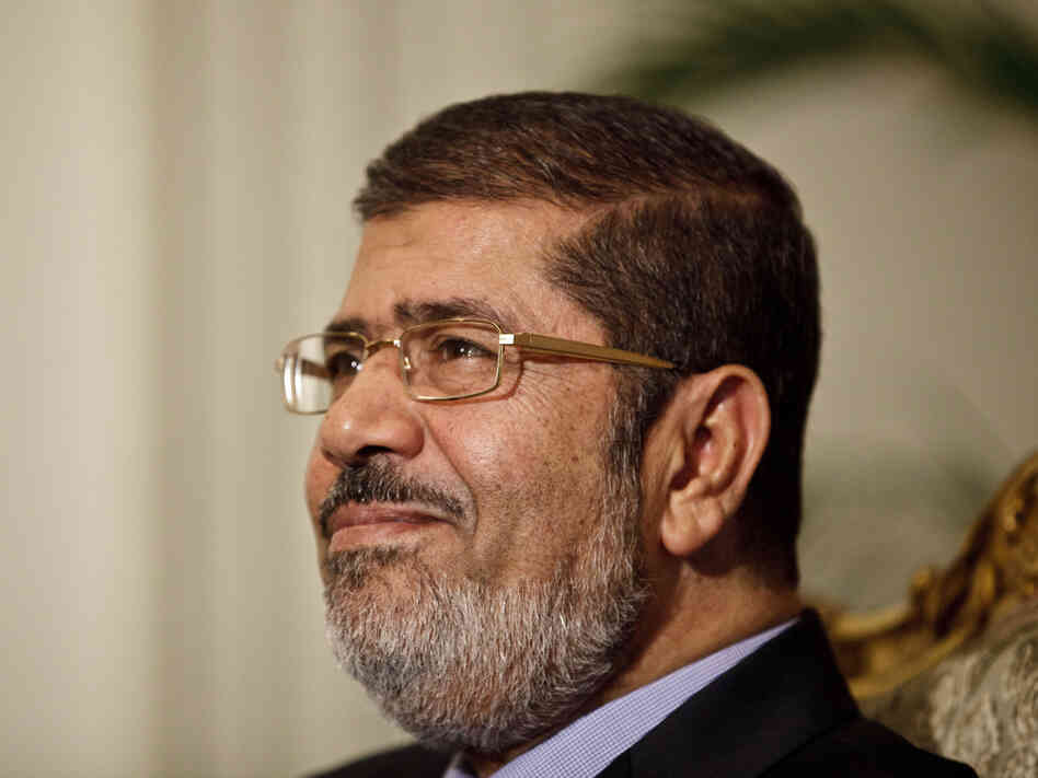 Egyptian President Mohammed Morsi held a "dialogue" in Cairo on Saturday. Overnight, an official announced the president would nullify a decree that gave him expanded powers.