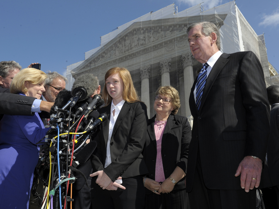 Abigail Fisher, the Texan involved in the University of Texas affirmative action case, accompanied by her attorney Bert Rein, right, talks to reporters outside the Supreme Court in October.