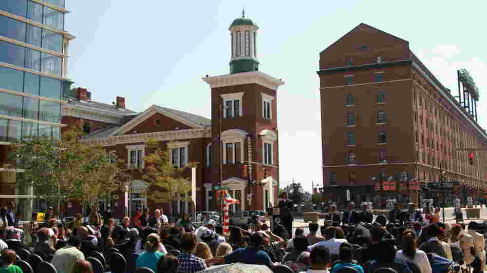 Hundreds gather in Baltimore's harbor Sept. 22 to witness the naturalization of nearly 50 new Americans.