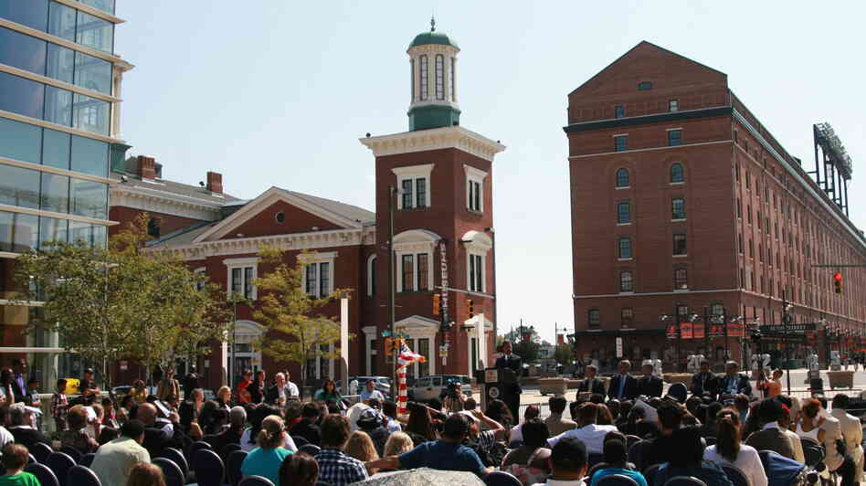 Hundreds gather in Baltimore's harbor Sept. 22 to witness the naturalization of nearly 50 new Americans.