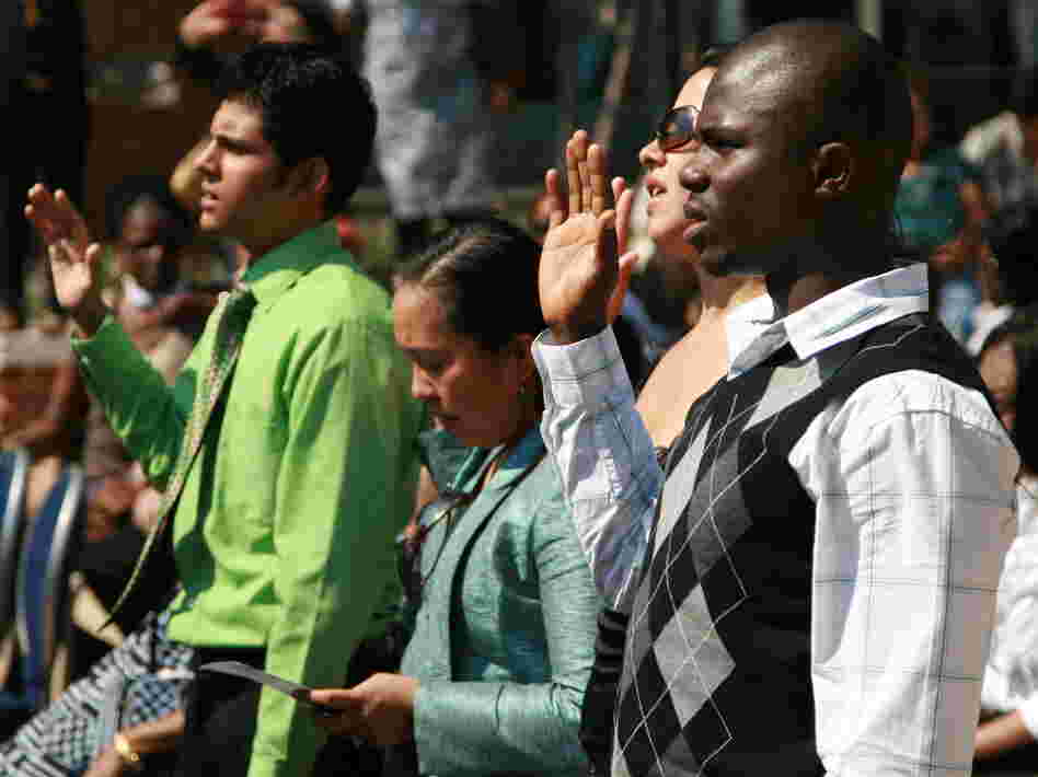 Nearly 50 immigrants took the U.S. naturalization oath at the Baltimore harbor on Sept. 22.