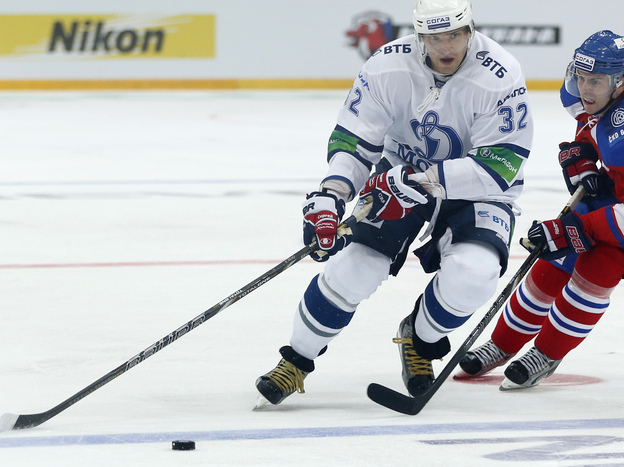 Erik Christensen, right, from Lev Praha challenges Alexander Ovechkin from Dynamo Moscow during their KHL ice hockey match in Prague, Czech Republic, Tuesday, Oct. 9. Ovechkin is among those NHL players who were signed by European clubs because of the NHL lockout.