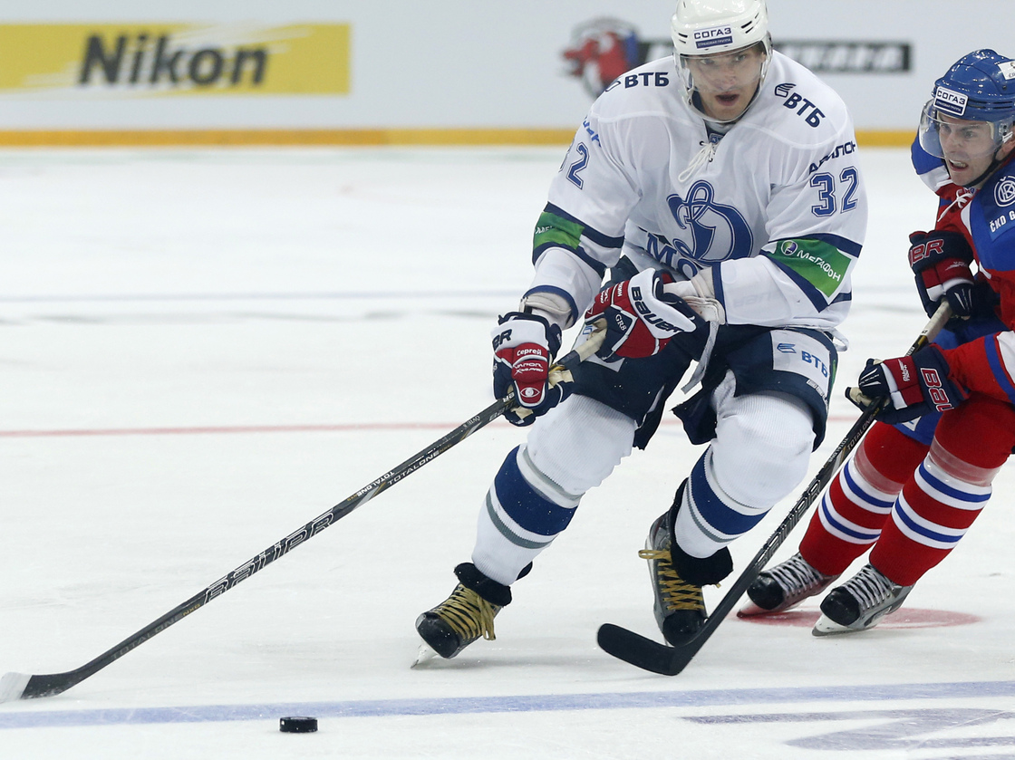 Erik Christensen, right, from Lev Praha challenges Alexander Ovechkin from Dynamo Moscow during their KHL ice hockey match in Prague, Czech Republic, Tuesday, Oct. 9. Ovechkin is among those NHL players who were signed by European clubs because of the NHL lockout.