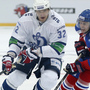 Erik Christensen, right, from Lev Praha challenges Alexander Ovechkin from Dynamo Moscow during their KHL ice hockey match in Prague, Czech Republic, Tuesday, Oct. 9. Ovechkin is among those NHL players who were signed by European clubs because of the NHL lockout.