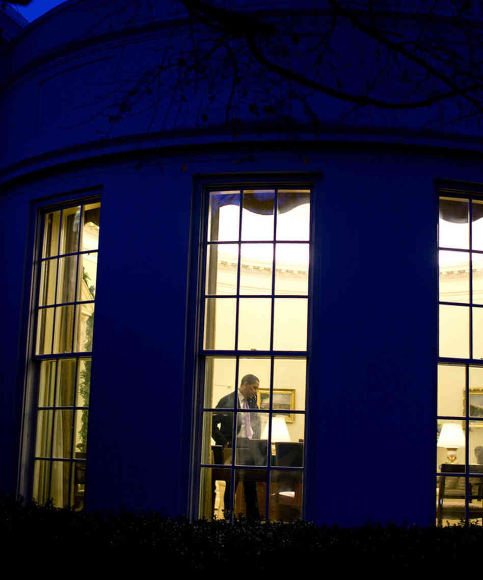 President Obama in the Oval Office, where there may be some more late night bargaining sessions before a deal is reached to keep the federal government from going over the "fiscal cliff." (December 2009 file photo.)